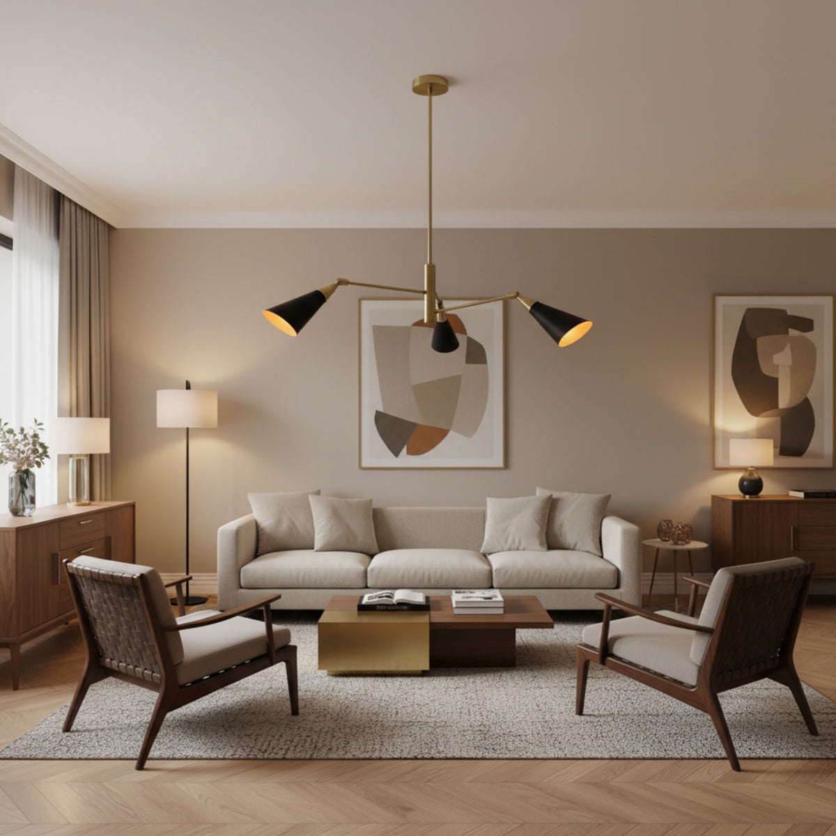 Antwerp 3 light brass and black cone chandelier shown from the front with warm illuminated shades.