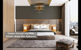 ontemporary bedroom interior with artistic brass disc pendant chandelier centered above a bed, creating warm atmospheric lighting