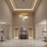 Athens 8 light layered chandelier shown from an angled view with sculptural dome shades and contrasting brass accents.