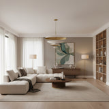 Athens 8 light layered disc chandelier shown from the front with sculptural ivory shades and elegant brass accents.