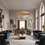 Athens 8 light sculptural layered disc chandelier shown in a full product view with ivory shades and brass suspension stem.