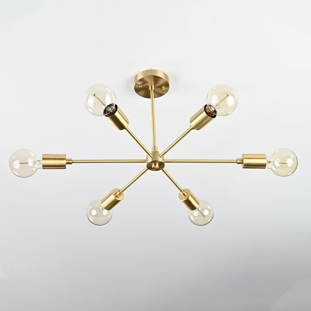 Athens Sputnik semi-flush mount chandelier featuring six exposed bulbs, radial arms, and Mid-Century Modern design.
