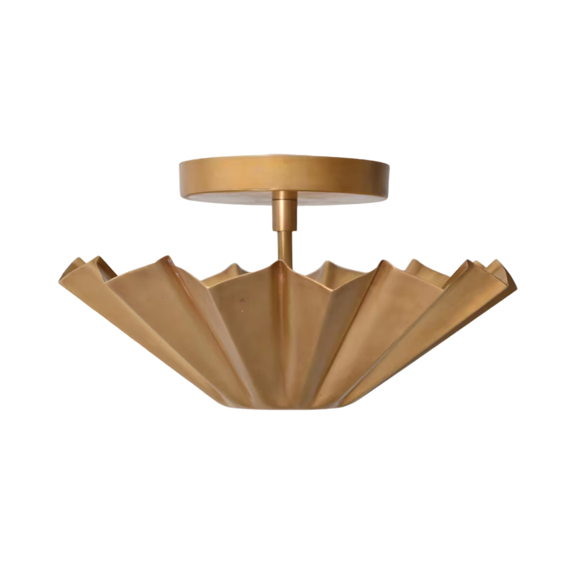 Angled front view of the Aurora Fluted Petal flush mount ceiling light showcasing its sculptural fluted brass shade and modern flush ceiling mount.