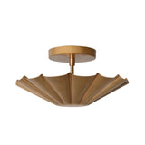 Front view of the Aurora fluted scallop flush mount ceiling light with a handcrafted brass fluted shade and contemporary low-profile design.