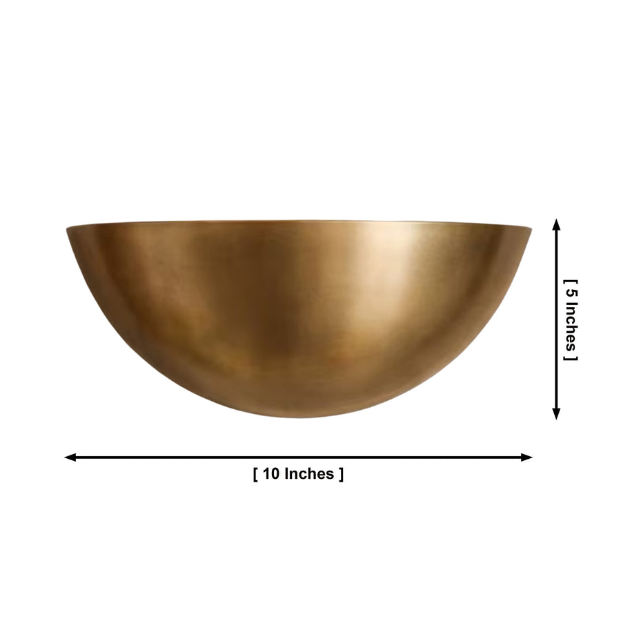 Aurora brass half bowl wall sconce providing warm upward ambient lighting in a modern bedroom – Model 32774