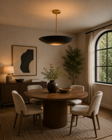 Aurora Layered Bowl Pendant Chandelier installed above a modern dining table, featuring a handcrafted matte black bowl shade with warm ambient illumination in a contemporary dining room.