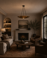 Aurora Modern Bowl Pendant Light installed in a contemporary living room, creating warm ambient lighting with its wide handcrafted bowl shade suspended above the seating area.