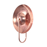 Angled front view of the Aurora modern copper halo wall sconce highlighting its polished circular reflector and contemporary sculptural silhouette.