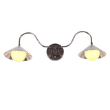 Illuminated front view of the Aurora modern polished nickel double wall sconce casting a warm glow through frosted globe diffusers beneath fluted metal shades.