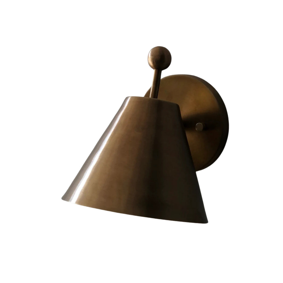 Front angled view of the Aurora modern satin brass tapered wall sconce with minimalist cone shade and round wall mount.