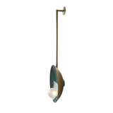 Side view of Aurora green disc wall sconce with frosted globe light and elongated brass stem – Model 32776