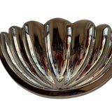 Close-up detail of the Aurora polished nickel fluted half bowl wall sconce highlighting its handcrafted ribbed texture and mirror-polished finish.