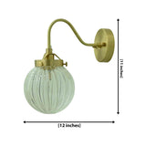 Austin brass wall sconce dimension diagram showing 12-inch width and 11-inch height with a curved metal arm and clear fluted glass globe.