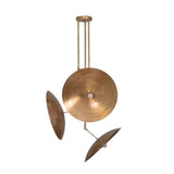 Avignon 3 light brass tone chandelier shown from the front with an asymmetric arrangement of circular disc shades.