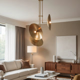 Avignon 3 light brass tone sculptural disc chandelier shown from the side with suspended rods and circular metal shades.