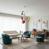 Bangkok 6 light multicolor sculptural chandelier shown from an angled view with red, blue and yellow shades and brass-tone multi-arm frame.