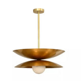 Belgravia double-disc pendant shown unlit with sculptural brass-tone saucer shades and a white opal globe.