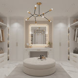 Berlin 8 light geometric chandelier shown from a low angle featuring black arms, brass bulb holders, and round ceiling canopy.