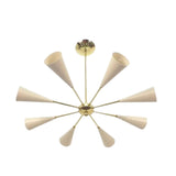 Full view of the Bern 8 light chandelier featuring elongated ivory cone shades arranged around a sculptural brass-tone central hub.