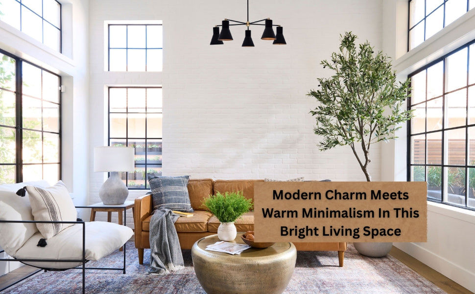 Contemporary black cone chandelier hanging in a bright living room with large windows, warm minimalism, and natural charm.