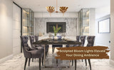 Sculpted brass bloom chandeliers enhancing the dining area with modern luxury and ambient golden lighting.