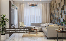Modern living room with a bold brass bowl chandelier, light wood accents, and a geometric accent wall.