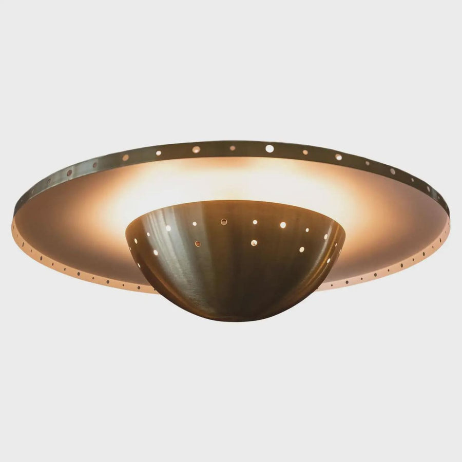 Brushed brass disc flushmount ceiling light showing smooth solid brass finish and low-profile design.