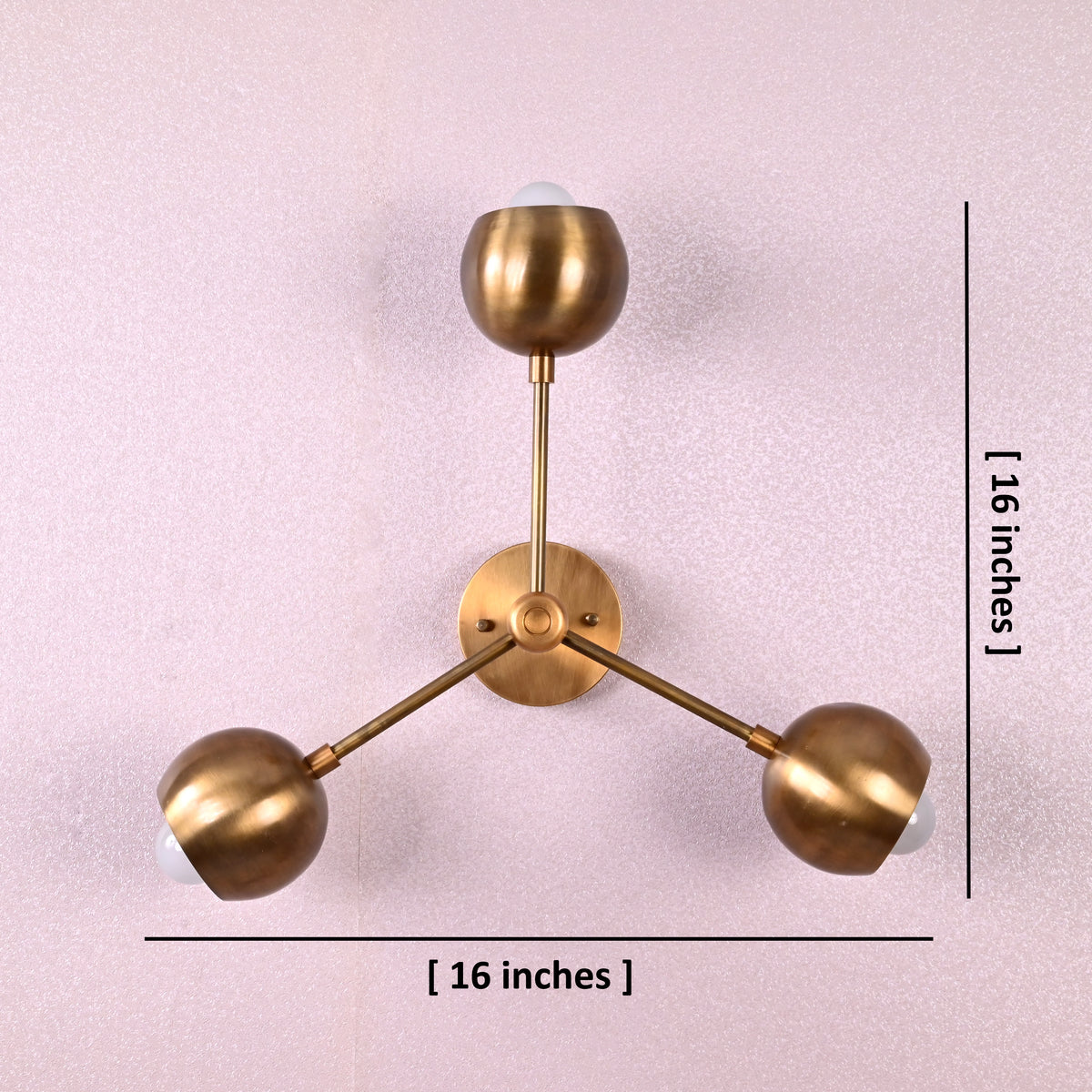 Brass 3-light ceiling lamp with spherical shades showing measurements of 16 inches width and 16 inches height
