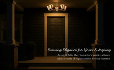Brass chandelier lighting up a stylish entryway exterior, adding sophistication and charm during nighttime.