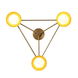 Top view of geometric 3-light brass dome chandelier forming a triangular pattern with softly glowing shades for balanced, ambient lighting.