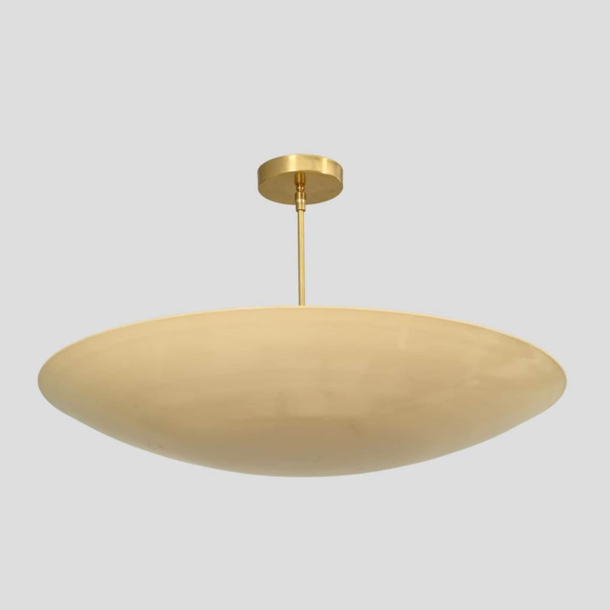 Handmade brass dome ceiling light with sleek bowl-shaped design, perfect for modern interiors.