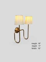 Brass wall sconce with two pleated shades shown with size dimensions, height 18 inches, depth 11 inches, width 16 inches.