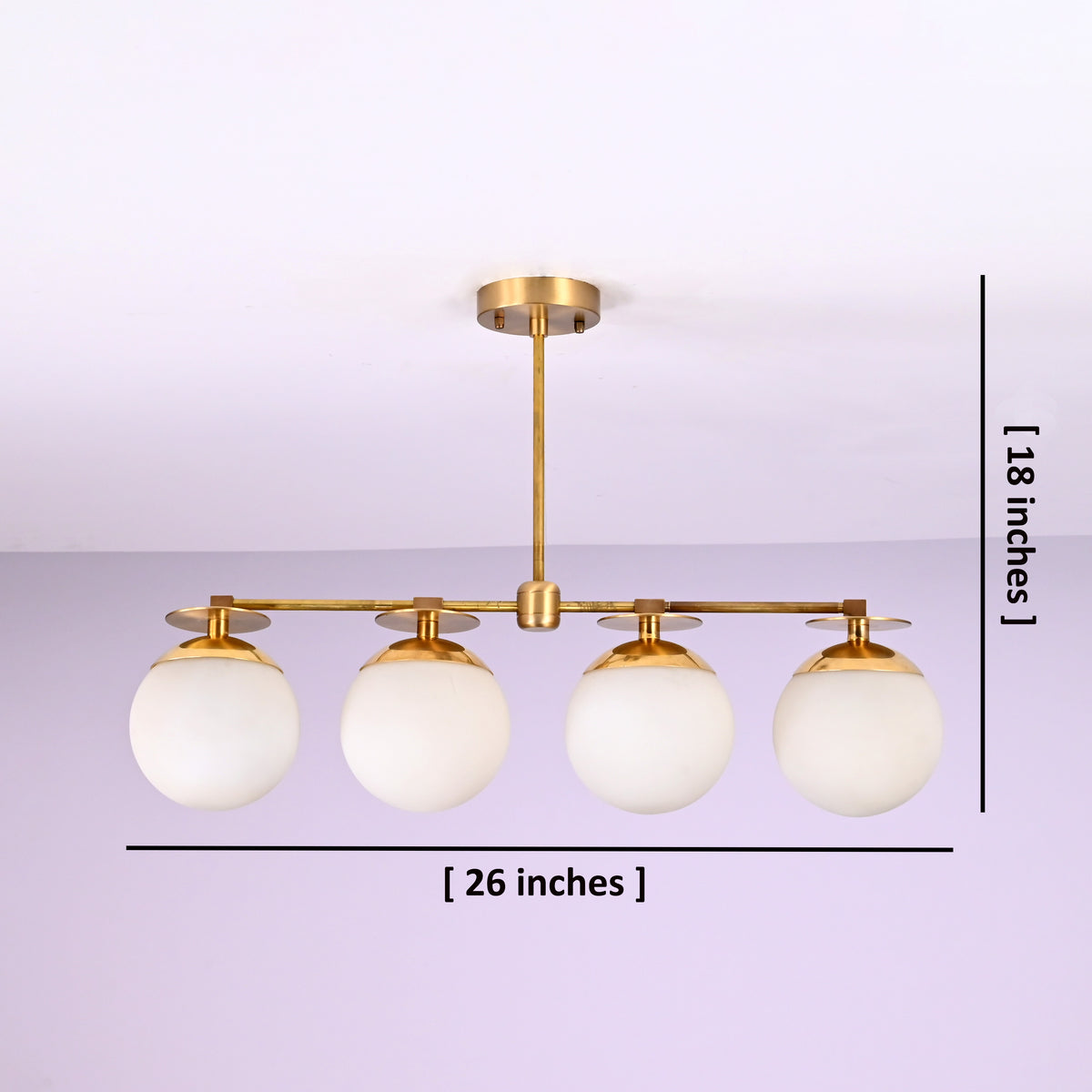 Handmade brass chandelier with four frosted globe shades, showing 26-inch width and 18-inch height, customizable modern ceiling light fixture.