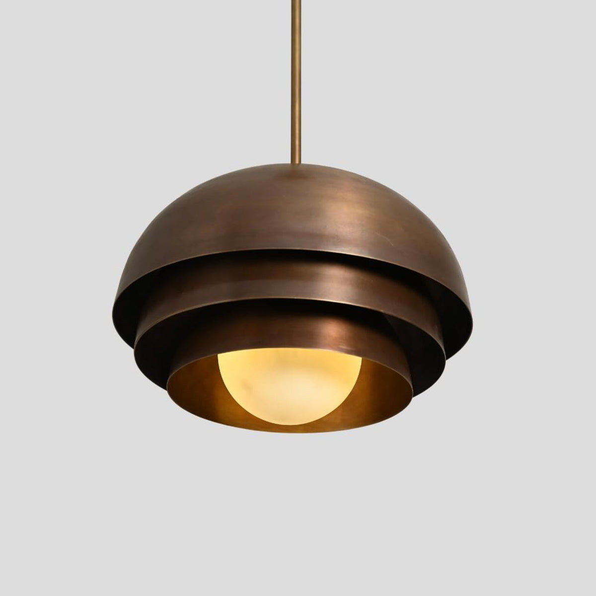 Retro brass hanging light with multi-layer dome design, featuring lacquer-coated brass for durability and style.