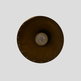 Underside view of brass perforated ceiling light showcasing inner bulb placement and handcrafted brass detailing.