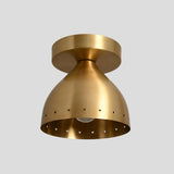 Modern brass semi flush mount ceiling light with perforated shade design, handcrafted from solid brass for warm ambient lighting.