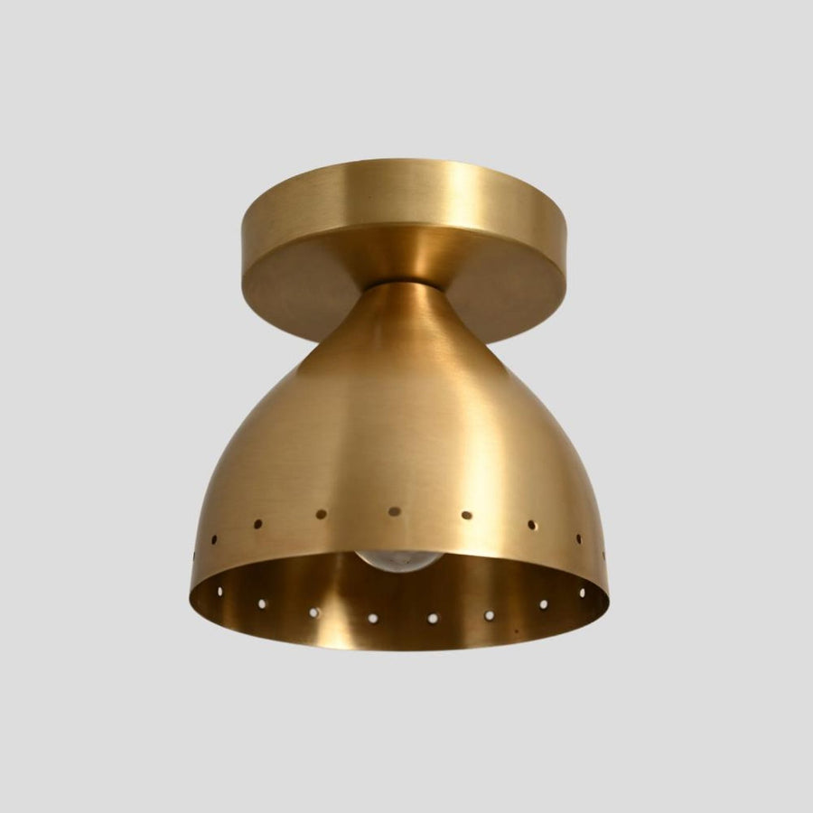 Modern brass semi flush mount ceiling light with perforated shade design, handcrafted from solid brass for warm ambient lighting.