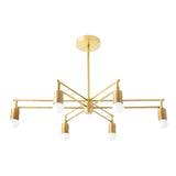 Angled view of the Brighton 6 light brass chandelier featuring sculptural linear arms and exposed white globe bulbs.