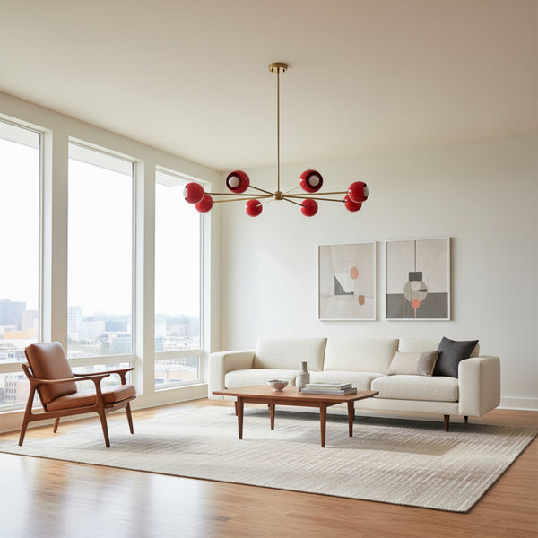 Brighton 8 light red globe Sputnik chandelier with brass-tone radial arms shown from a front angled view.