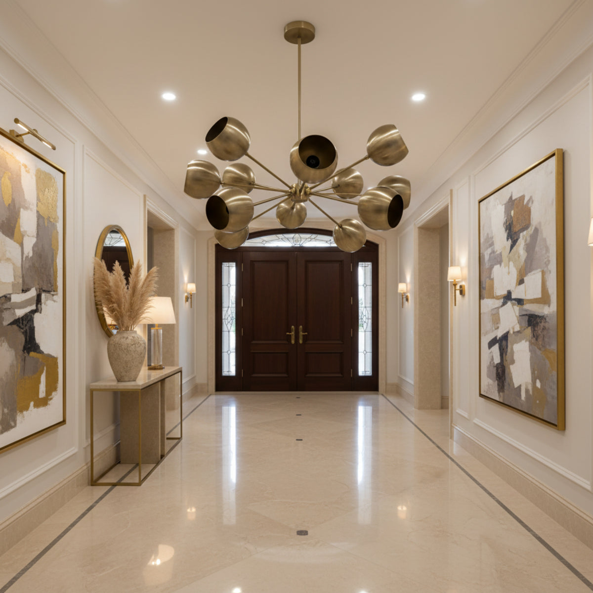 Brussels 12 light aged brass chandelier shown from an angled view highlighting its rounded shades and radiating multi-arm design.