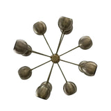Brussels 12 light aged brass globe chandelier shown from below highlighting the radial arm arrangement and sculptural metal shades.