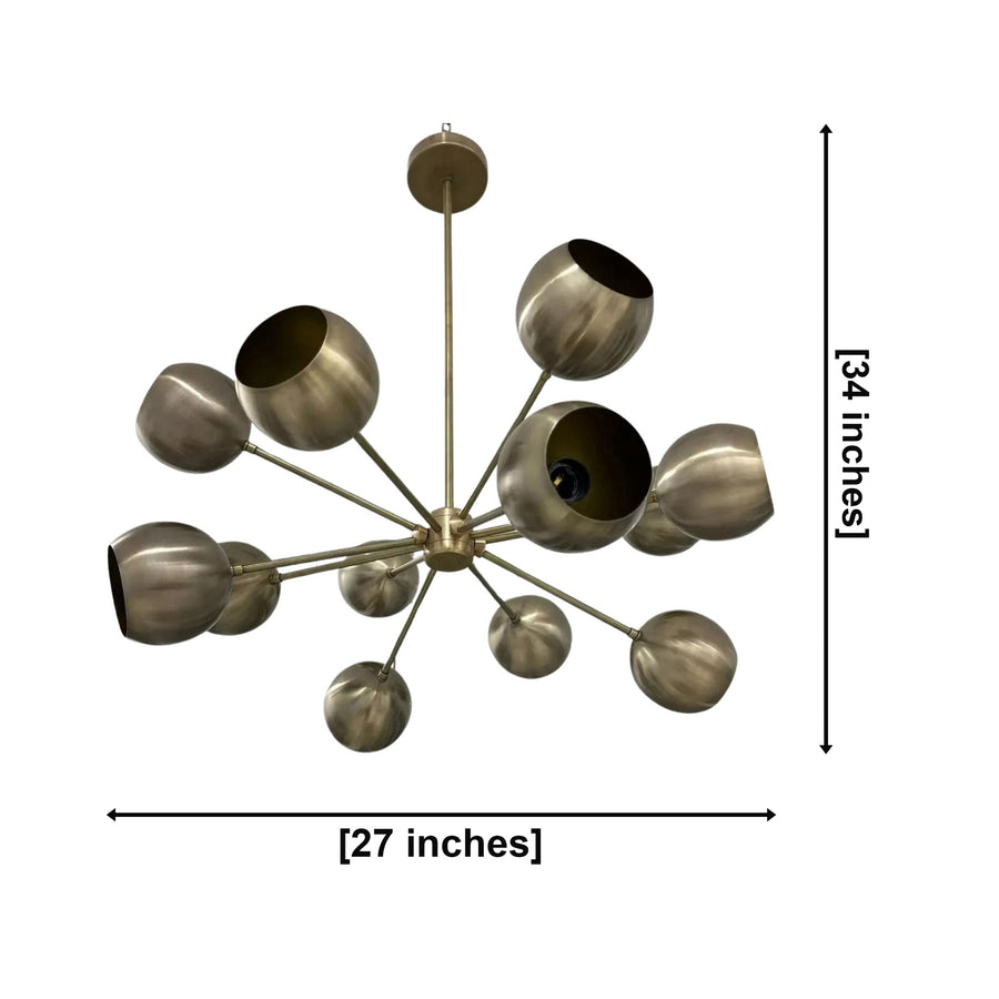Brussels 12 light aged brass sculptural globe chandelier shown from the front with radiating arms and rounded metal shades.