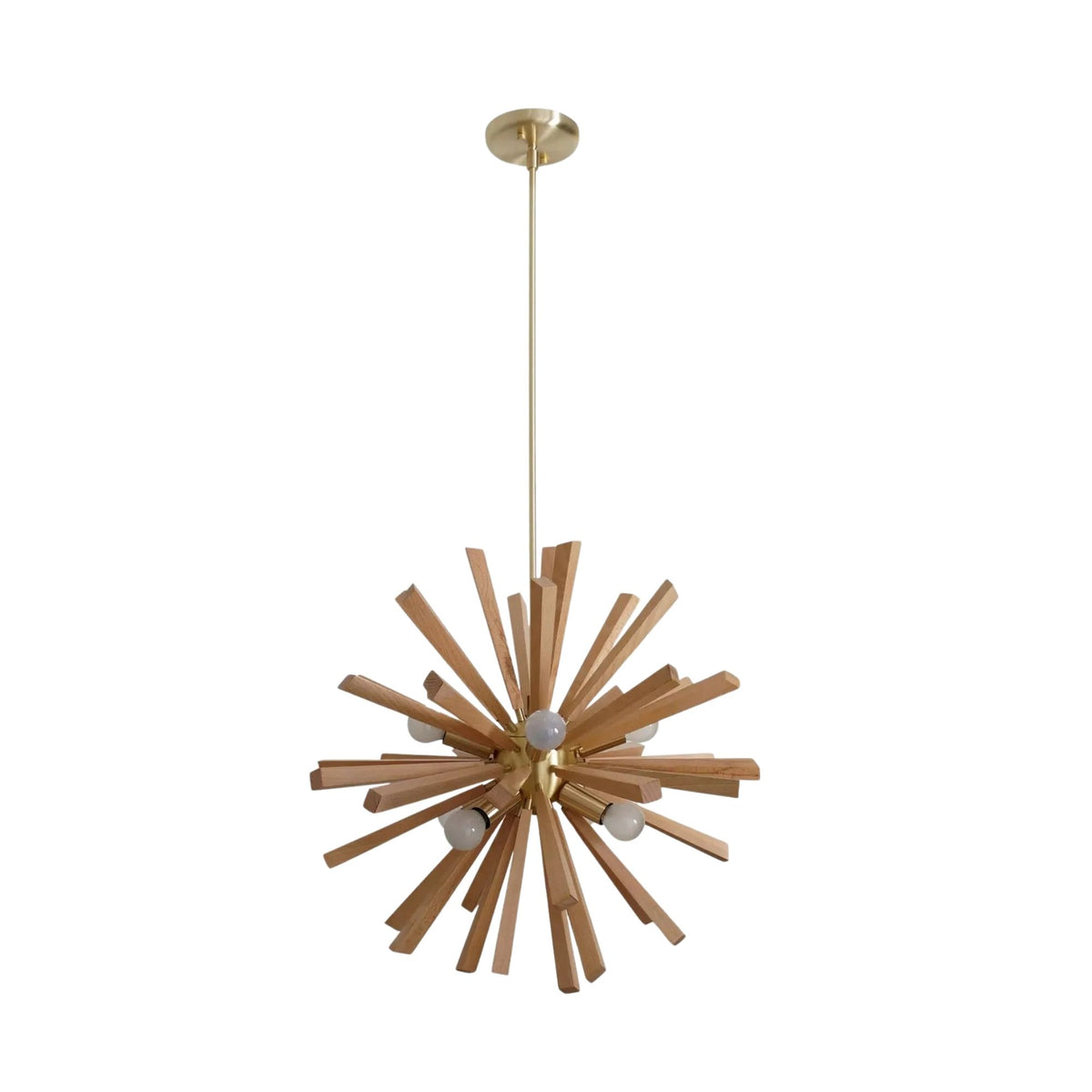 Brussels 8 light wooden starburst chandelier shown from the front with natural wood rods, brass-tone frame and globe bulbs.