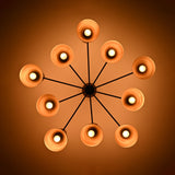Bottom view of Cairo Diabolo chandelier with ten glowing cone shades and symmetrical Mid-Century layout.
