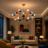 Cairo 18 light multicolor Sputnik chandelier illuminated in a contemporary living room with colorful cone shades and warm ambient lighting.