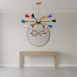 Cairo 18 light colorful Sputnik chandelier shown from a side angle with brass-tone arms, cone shades, and exposed globe bulbs.