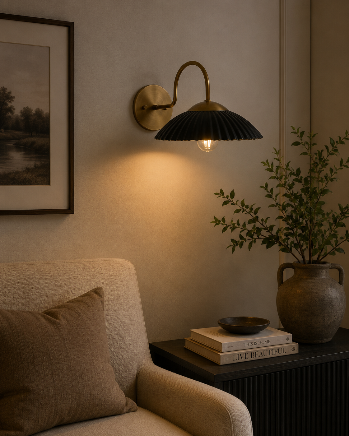 Cambria black fluted dome wall sconce with brass arm installed in a warm modern living room – Model 32785