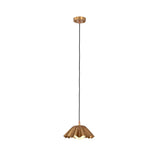 Full hanging view of the Cambria Fluted Petal Pendant Light with a handcrafted fluted brass shade, adjustable black cord, and minimalist ceiling canopy.