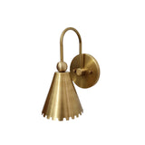 Angled view of the Cambria Scalloped Cone Wall Sconce highlighting the handcrafted brass cone shade, decorative scalloped edge, curved arm, and spherical accent.
