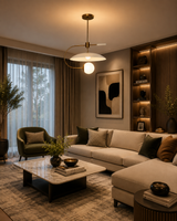 Cannes 1 light brass and white chandelier illuminating an elegant contemporary living room with neutral furnishings.
